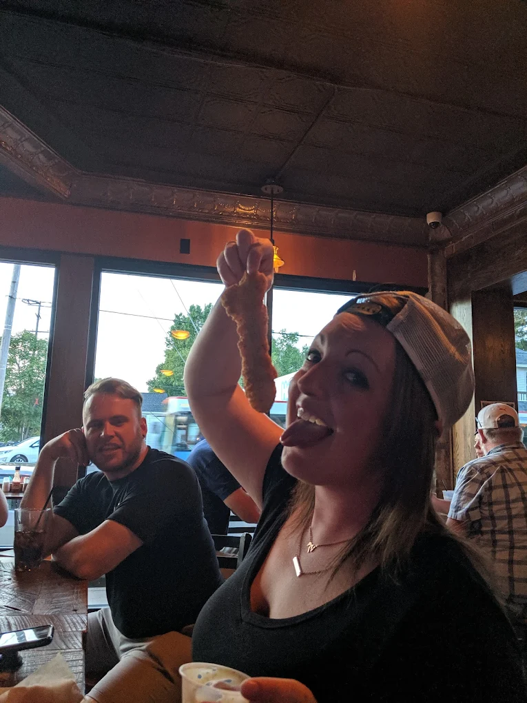 Guests having a great time inside Duke's Bar